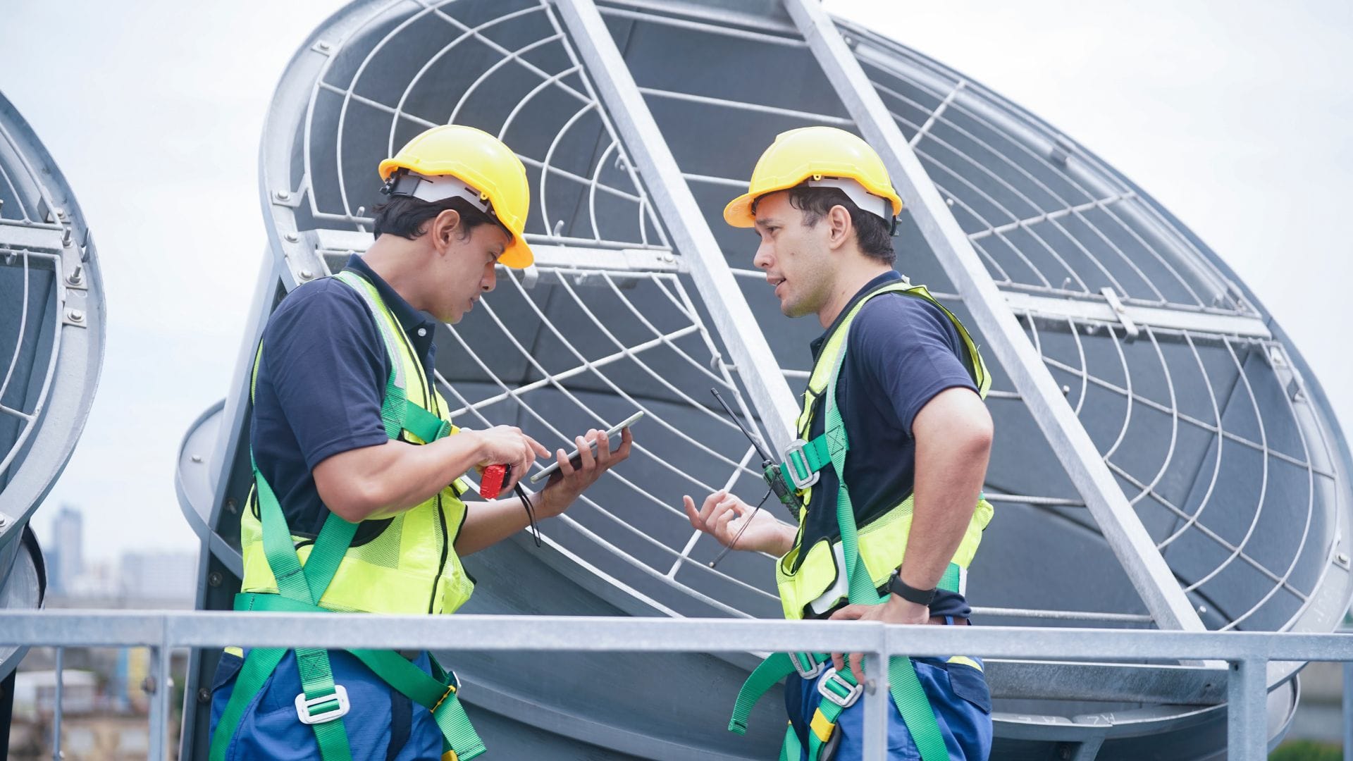 Commercial HVAC techs on a rooftop