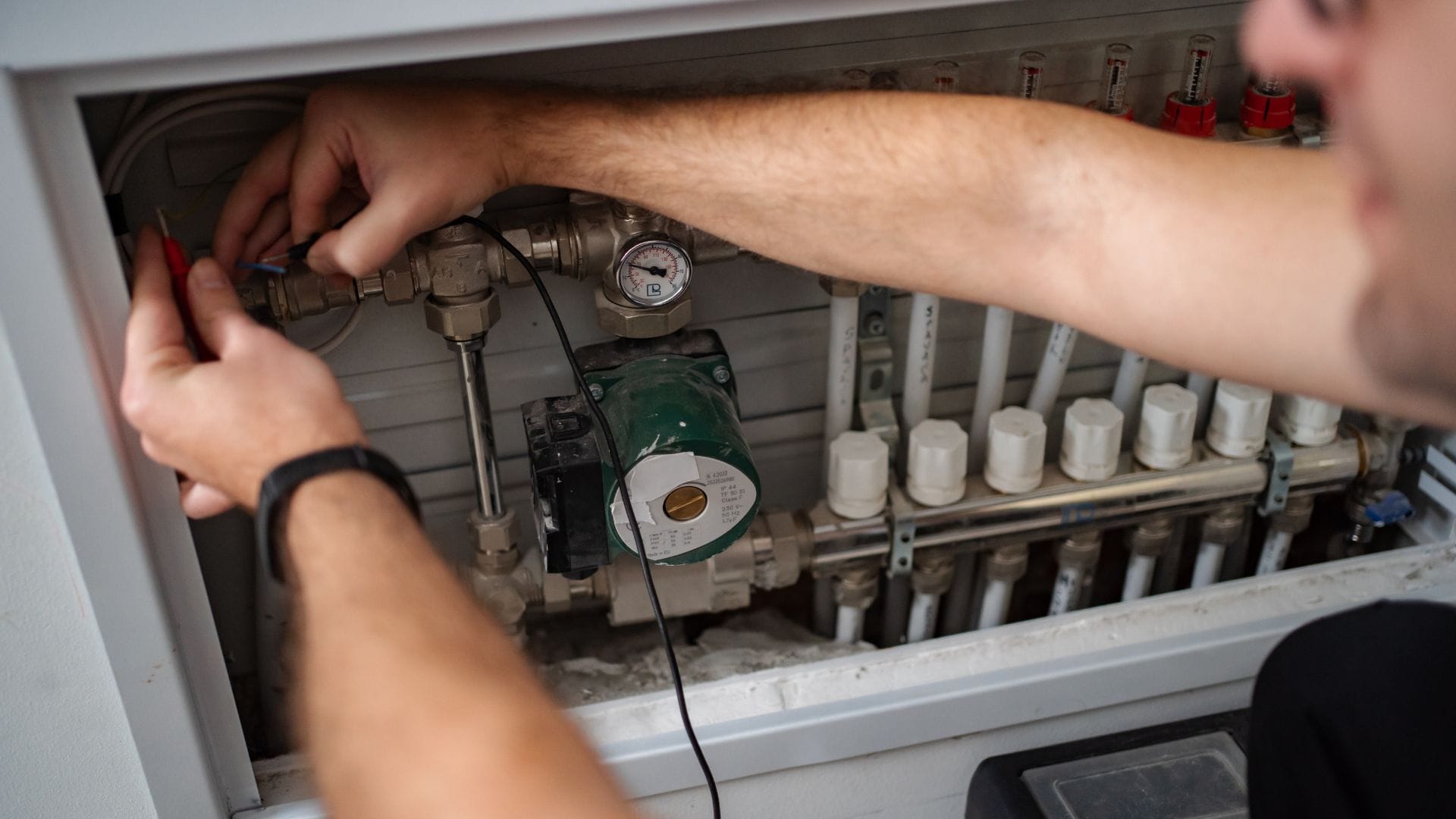 Heating system pipe and manifold work