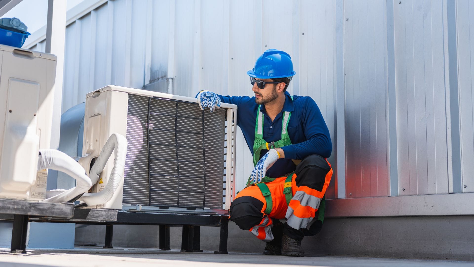 AC repair technician at work